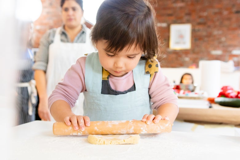 girl with rolling pin